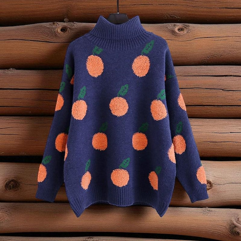 Orangina - Strickpullover mit Fruchtmuster